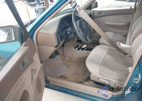 1993 Mercury Tracer z USA, uszkodzony, nr VIN 3MAPM10J7PR659799